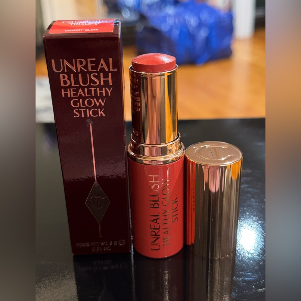 Charlotte Tilbury Unreal Lip & Cheek Glow Blush Stick in Cherry Glow
